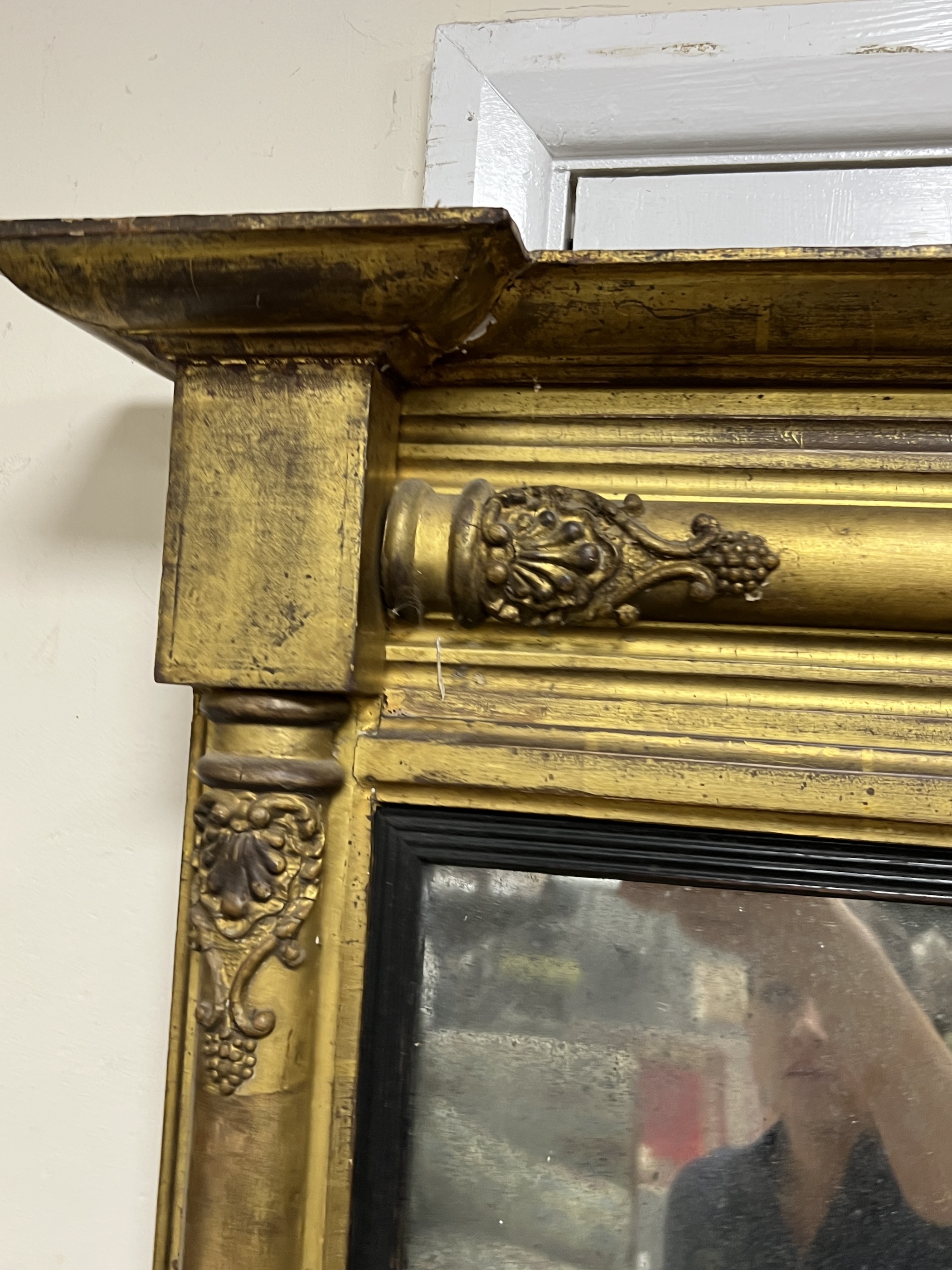 A late Regency giltwood and composition pier glass, width 55cm, height 62cm